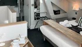 Photo de la chambre classique la Mémard de l'hôtel les Suites du Lac.